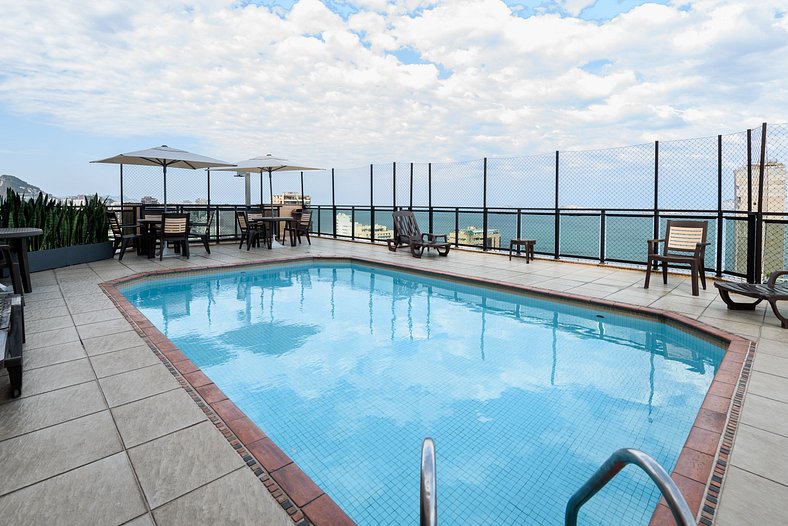 Apartment pool and balcony overlooking the sea and Christ