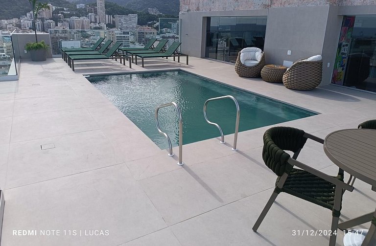 Apartment pool and balcony overlooking the sea and Christ