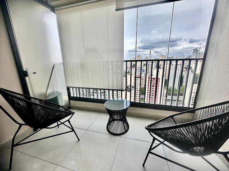 Studio com coworking, piscina e vista da cidade