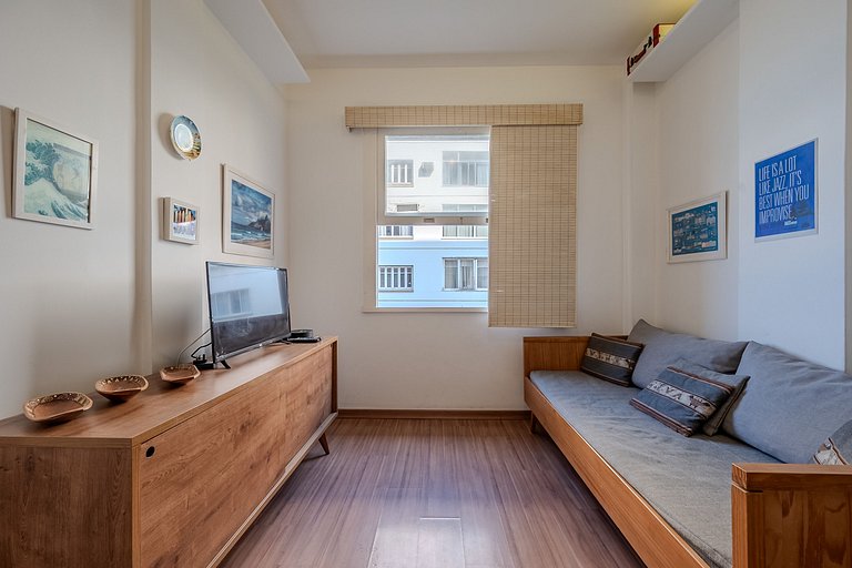 View of Copacabana beach, bedroom and living room