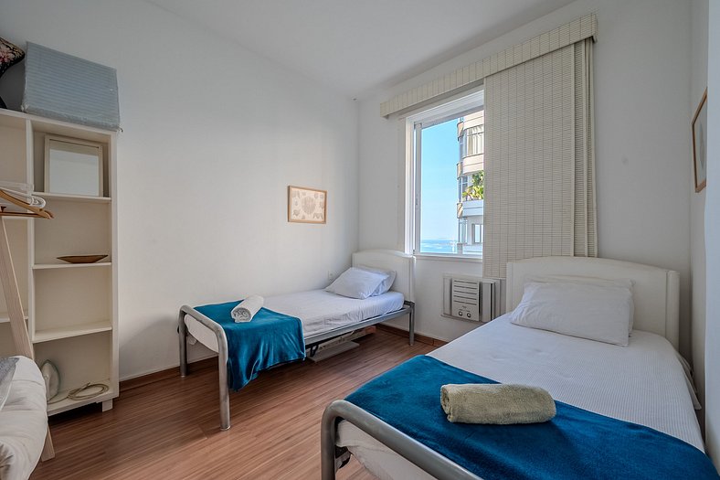 View of Copacabana beach, bedroom and living room