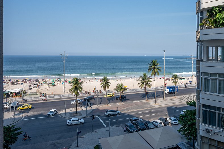 View of Copacabana beach, bedroom and living room