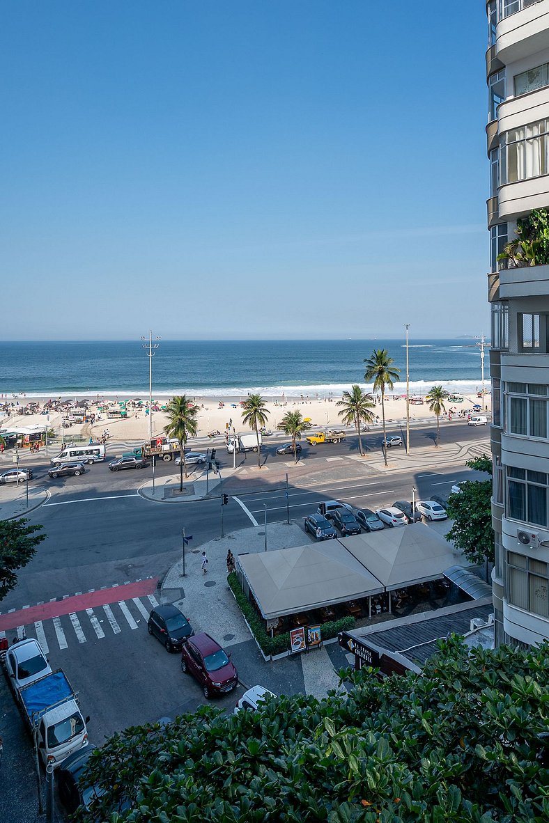 View of Copacabana beach, bedroom and living room