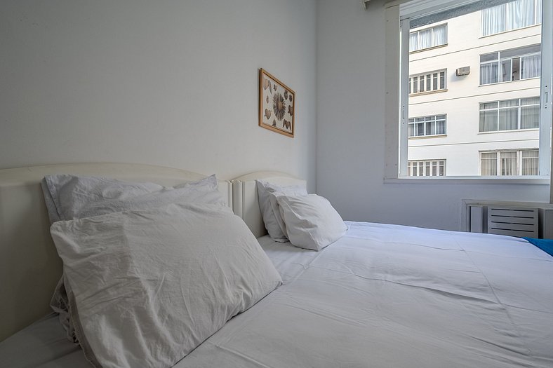 View of Copacabana beach, bedroom and living room